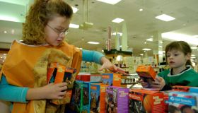 2/22/2008 Photo by Krissy Krummenacker 200800371 Mackenzie A. Hadfield, left, 8, second grader at Wyomissing Hills, and Emily G. Hornberger, 6, a first-grader homeschooled from Spring Township, set up boxes of Girl Scout cookies they are selling at the Bo